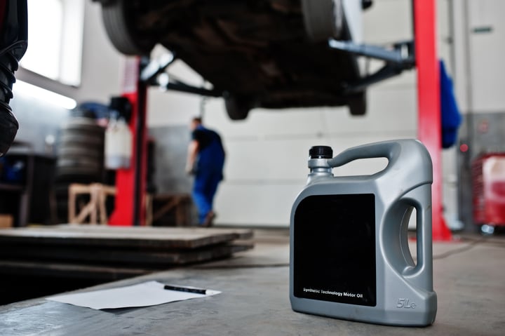 car-repair-maintenance-theme-gray-plastic-canister-motor-oill-auto-service