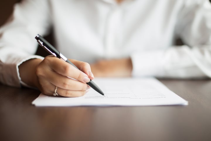 sitting-human-woman-workplace-paper